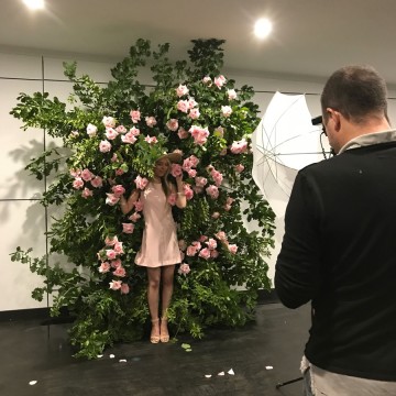 Paige Ellis embraces the trend with flowers by Melbourne Flower School. Picture: Alex Coppel.
