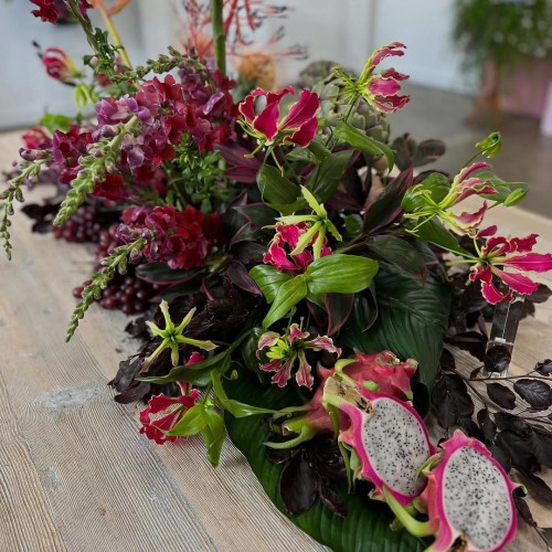 Dragon fruit, Grapes and Artichokes - a feature along with dark hues of the Copper beech and snapdragons. Beautiful Gloriosa Lily a highlight