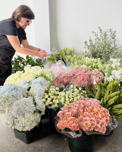 Working with beautiful seasonal blooms fresh from the cool room floor